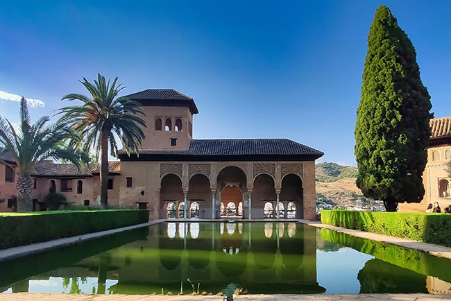 He is not a full man who does not own a piece of land. 1 House with arches